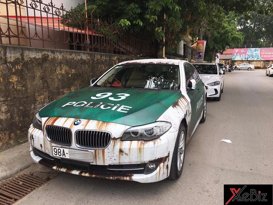Chiếc BMW 5-Series dán đề-can theo phong cách xe cảnh sát đồng nát