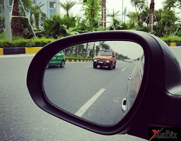 mercedes-benz-g63-amg-khoac-ao-cam-ruc-tren-pho-ha-noi